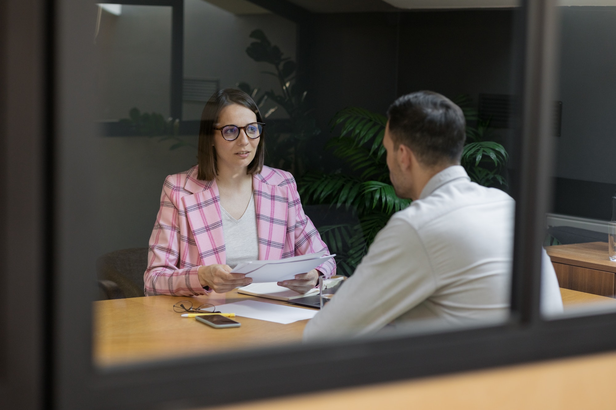 a woman and a man in business negotiations, office work, opening a vacancy for a new position